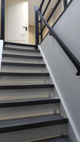 Vierkante trapleuning